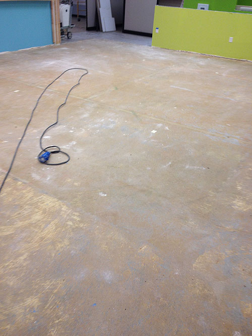 Concrete Floors with glue from previous carpet